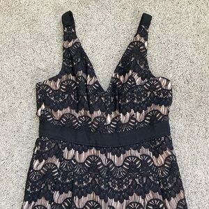 Beautiful black lace, fully lined jumpsuit romper with pockets!